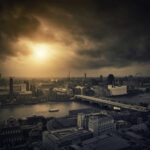 RADIOACTIVE Drone VIDEO Sparks London Panic… Aerial view of a city skyline at sunset with a river and dramatic clouds