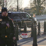 White House Shooter’s Fatal OBSESSION Exposed! Secret Service agent standing near restricted area sign.