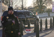 White House Shooter’s Fatal OBSESSION Exposed! Secret Service agent standing near restricted area sign.