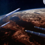 Astronaut’s Year-Long SPACE TEST – Why It Matters? Rockets in space orbit Earth with the moon visible.