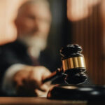 Blue States SCORE Stunning Court WIN Judge's gavel striking sounding block in courtroom