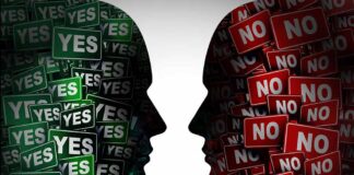 Silhouettes of two heads filled with yes and no signs