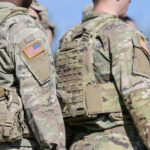 DEADLY Training ‘Accident’ — Or Something Else? Soldiers in camouflage uniforms with American flag patches.