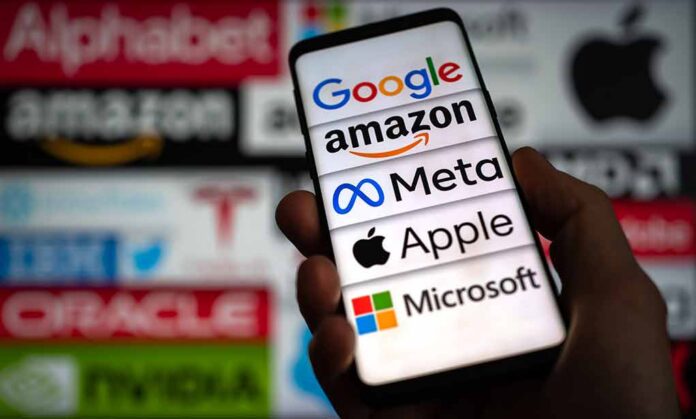 shutterstock_2297530397 Smartphone screen showing major tech company logos