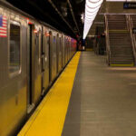 Subway Fight Turns Fatal — One Dead, Station Shut Subway station platform with train and exit stairs.