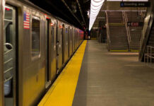Subway Fight Turns Fatal — One Dead, Station Shut Subway station platform with train and exit stairs.