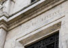 Building with Federal Reserve inscription in stone facade.