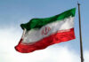 Tel Aviv’s Bet on Pahlavi — Dangerous Gamble? Iranian flag flying against a clear sky.