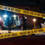 Safety Lapses Exposed — Bangkok’s Nightmare Yellow police tape at a nighttime crime scene.