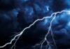 Lightning Misses Mom by Inches Lightning bolts streak across dark storm clouds