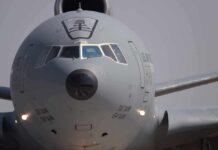 NATO Fuel Hub Falls Into Iran’s Crosshairs Front view of a large military cargo aircraft on the runway