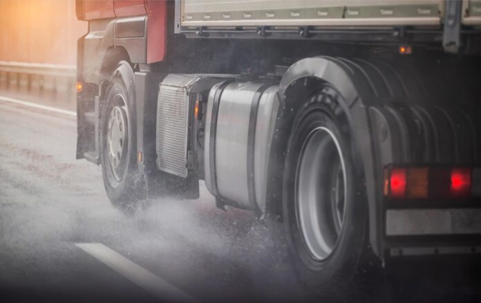 Truck,Chassis,And,Wheels,On,A,Wet,Road,In,Rainy