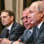 Prediction Market Shock: Putin Timer Ticking Group of government officials engaged in a serious discussion during a meeting