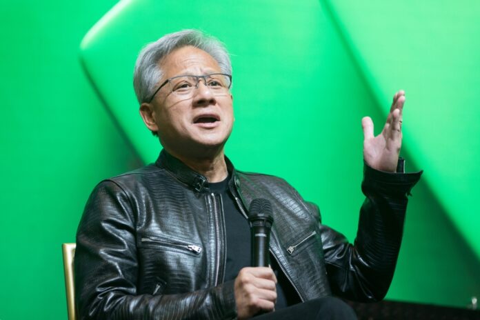 Jensen,Huang,Nvidia's,Founder,,President,And,Ceo,Gestures,During,A James Comey