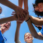 Women’s Sports Shielded — For Now Capitol building with large dome under clear blue sky