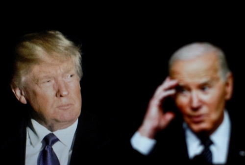 Donald Trump and Joe Biden in dark background.