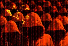 Men in hoodies behind binary code and Chinese flag.